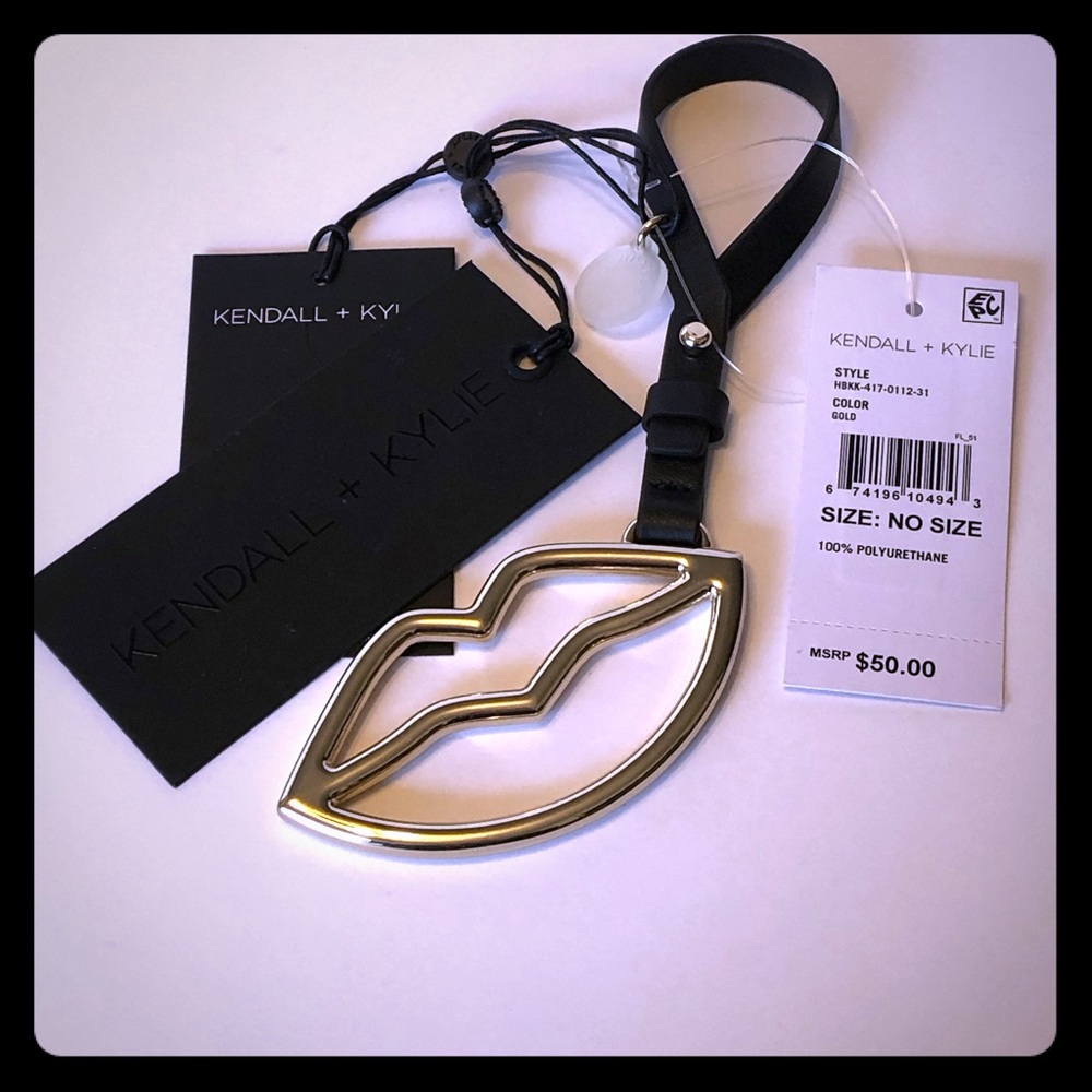 Kendall and Kylie gold metal lip purse tag